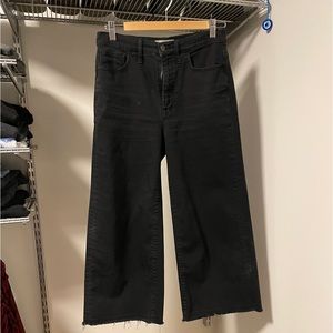 Madewell faded black wide leg crop denim with raw hem